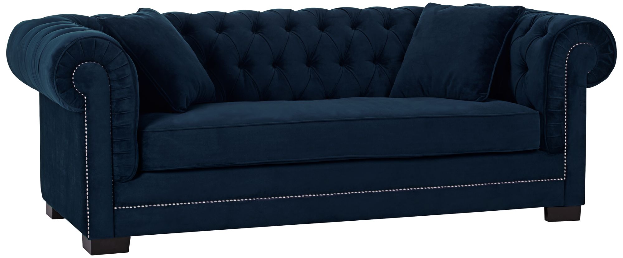 Our fabulous velvet tufted sofa is the centerpiece of this 