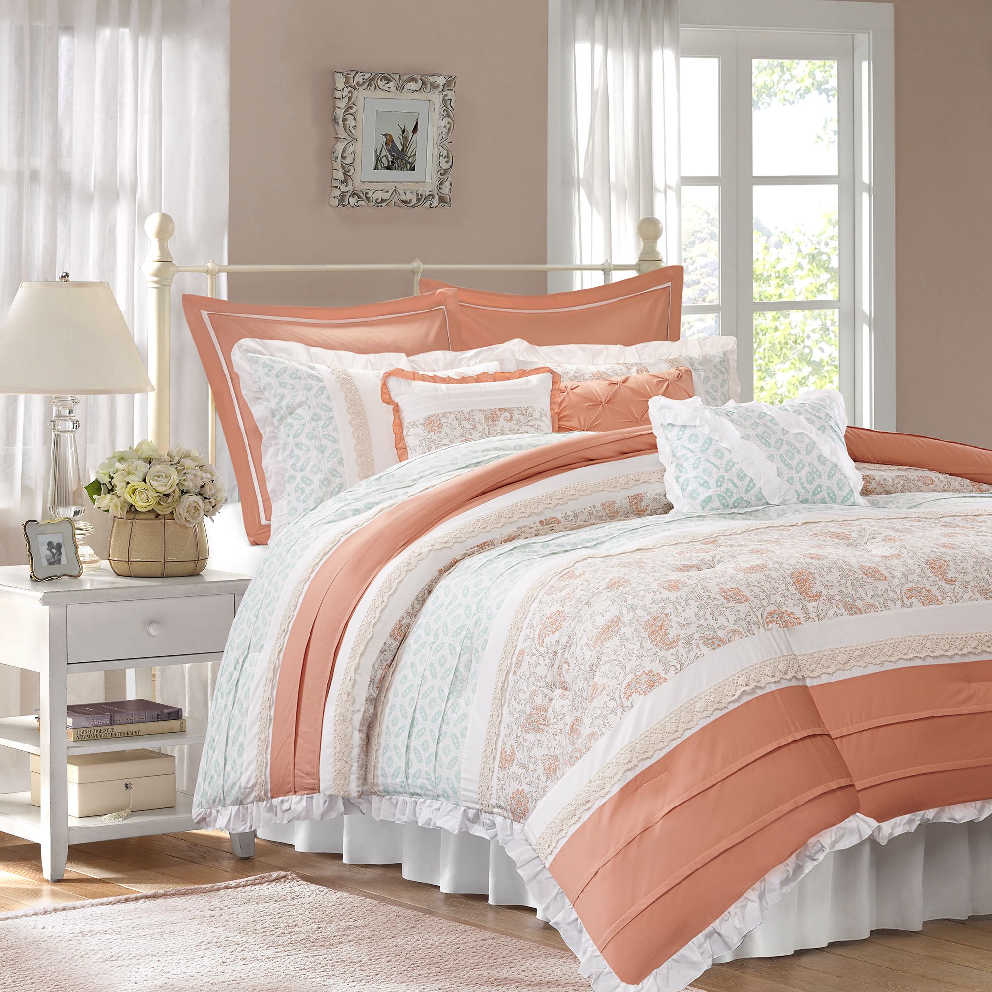 coral colored comforter        
        <figure class=